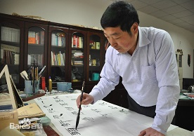 毛国典